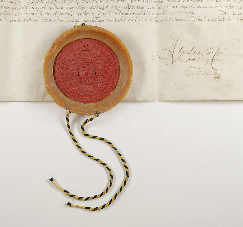 Die Abbildung zeigt einen Ausschnitt des Linzer Diploms von 1646 mit dem Siegel.